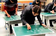 育英德景园小学：举行教师廉洁粉笔字比赛活动
