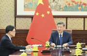 习近平听取李家超述职报告