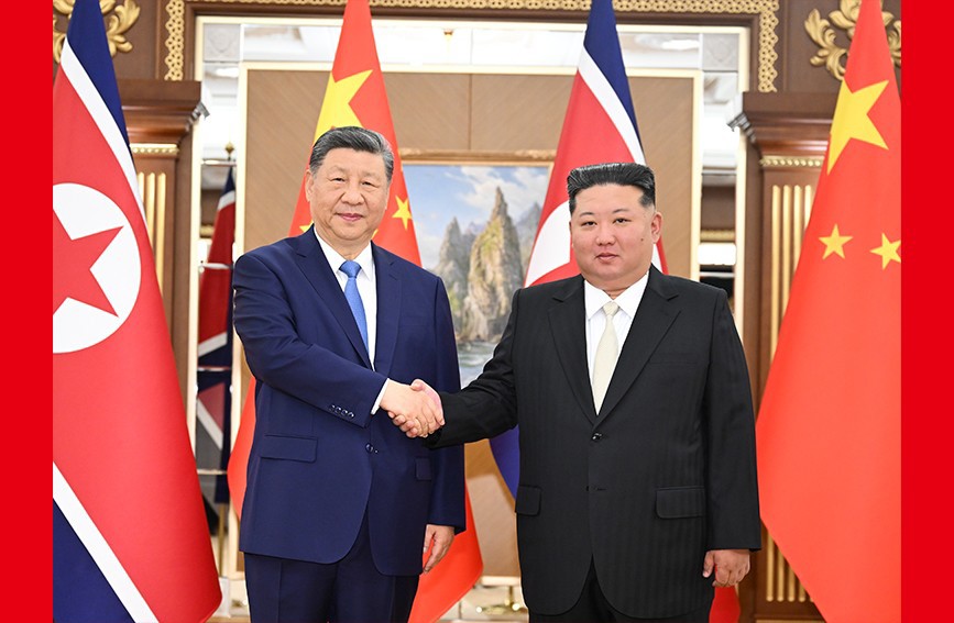 习近平同金正恩举行会谈